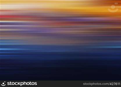 Abstract and technology background. Motion effect of colorful night light in city.