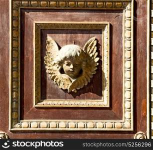 abstract angel texture of a brown antique wooden old door