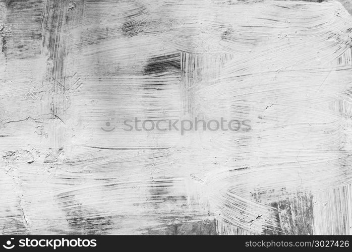 Abstract art background from white color painted on black wood b. Abstract art background from white color painted on black wood background. Retro or vintage backdrop.