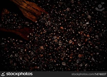 abstract background and detail coffee beans original process by hand on dark and light flashing with selective focus top view photo
