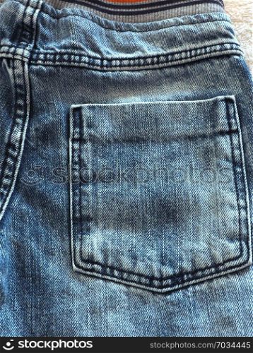 abstract background back pocket on children`s jeans