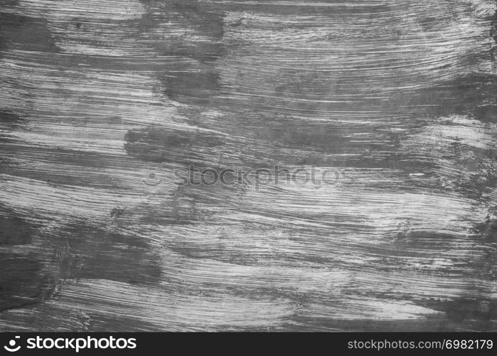 Abstract background, black color painted on white wall, art brush stroke.