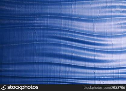 Abstract background: blue wavy texture. Decorative wall decoration.. Abstract background: blue wavy texture. Decorative wall decoration
