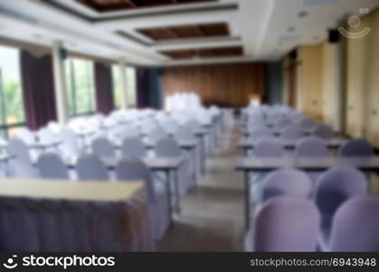 Abstract background blur and a conference room chair.