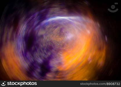 Abstract background blur color spin pattern.