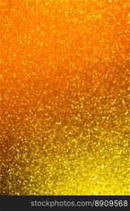 Abstract background filled with shiny gold glitter