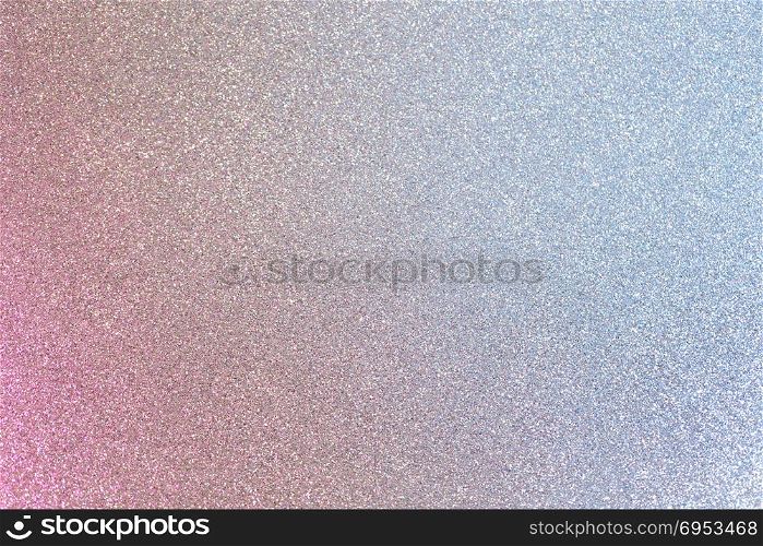 Abstract background filled with shiny silver and pink glitter. Shiny pink and blue silver glitter