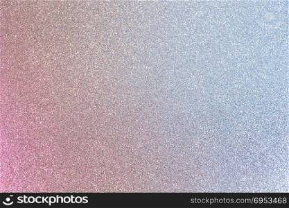 Abstract background filled with shiny silver and pink glitter. Shiny pink and blue silver glitter