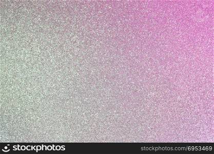 Abstract background filled with shiny silver and purple glitter. Shiny silver and purple glitter