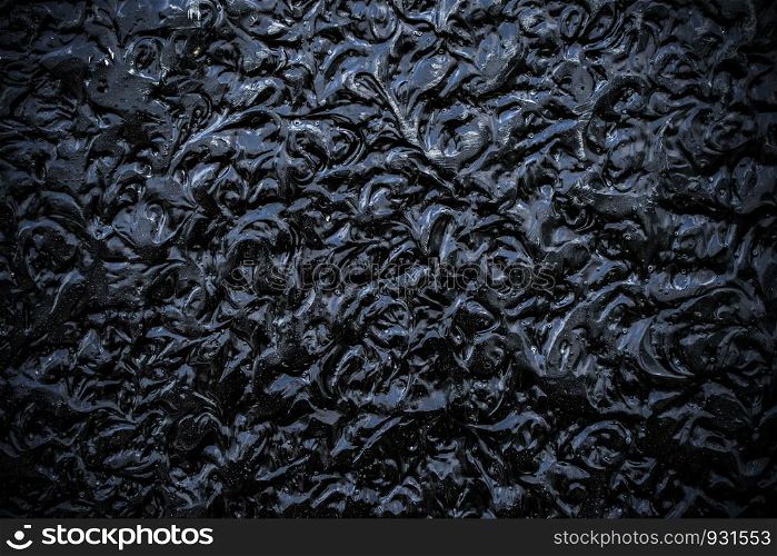 Abstract background from black color painted on wall. Dark texture and pattern backdrop.