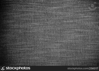 Abstract background from black fabric texture. Picture for add text message. Backdrop for design art work.