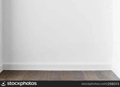 Abstract background from blank white concrete wall at home or office with wooden floor. Picture for add text message. Backdrop for design art work.