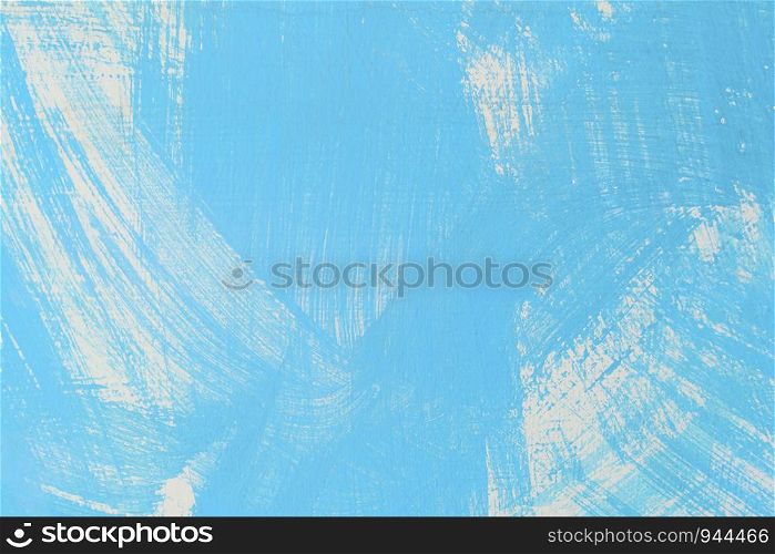 Abstract background from blue color painted on old concrete wall. Retro and vintage wallpaper backdrop.