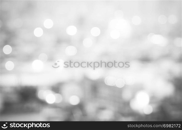 Abstract background from blurred reflection on sunlight with water wave in the sea in monochrome. Travel and holiday backdrop.
