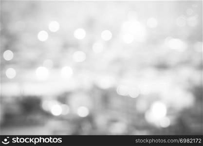 Abstract background from blurred reflection on sunlight with water wave in the sea in monochrome. Travel and holiday backdrop.