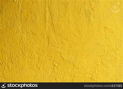 Abstract background from golden wall texture with sunlight. Luxury and elegant wallpaper.