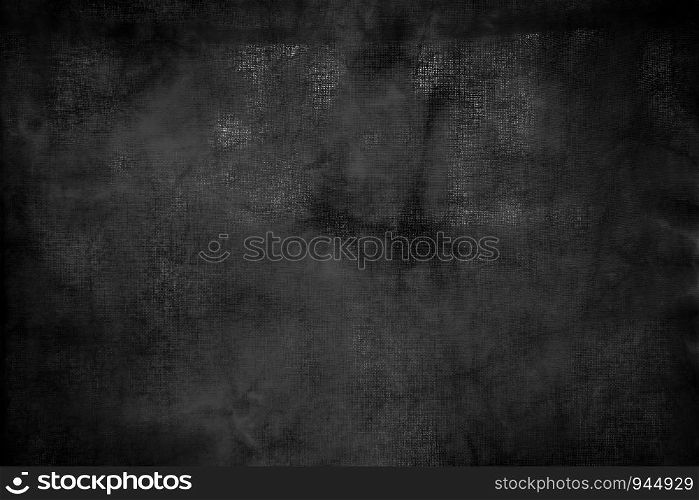 Abstract background from old black wood table with grunge and scratched. Retro and vintage backdrop.