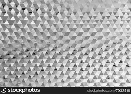 Abstract background from triangle shape glasses pattern decorated on wall. Modern white wallpaper.