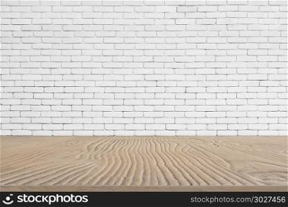 Abstract background from wooden table top with white brick wall . Abstract background from wooden table top with white brick wall background. Picture for add text message. Backdrop for design art work.