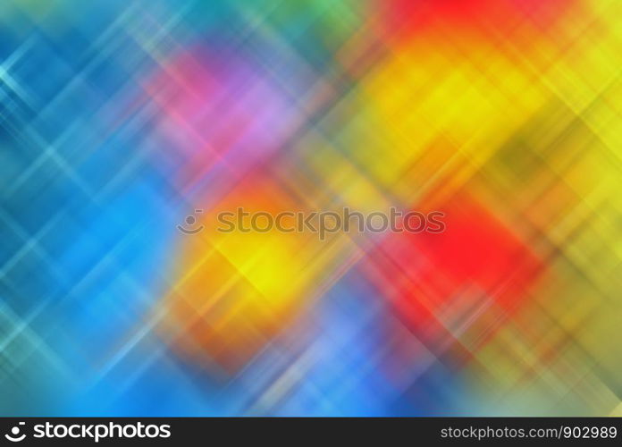 Abstract background of a blurred geometric grid texture in vivid colors of blue, red and yellow. Colorful creative backdrop with copy space for digital wallpaper or print and web design.