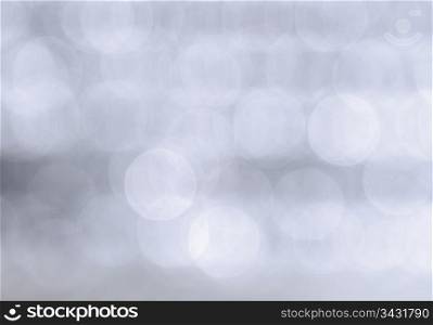 Abstract background of a blurry toned lights.