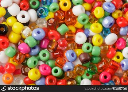 abstract background of close up multi colored beads