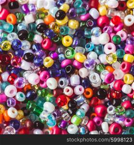abstract background of close up multi colored beads. The beads background