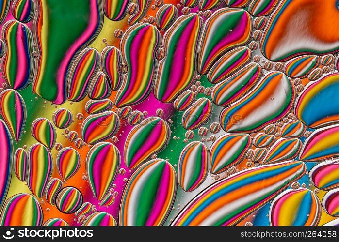 Abstract background of colorful oil drops on water surface. Abstract background of colorful oil drops on water