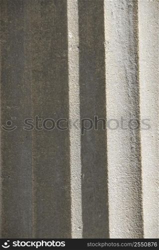 Abstract background of grey concrete column fragment