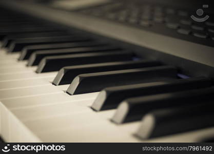 abstract background of Piano Keyboard synthesizer closeup key frontal view