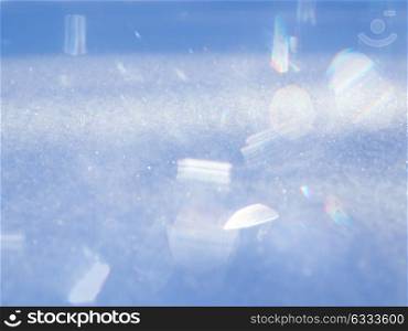 abstract background of snow texture sparkling in the sun