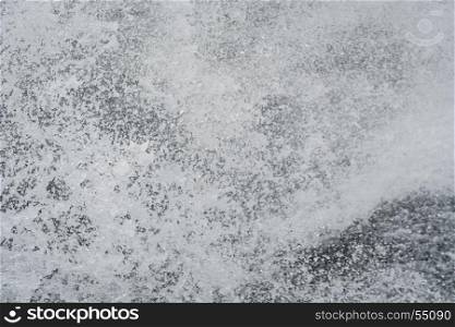Abstract background of water in the ocean shows lots of turbulence and splash.