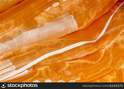 Abstract background - orange fabric