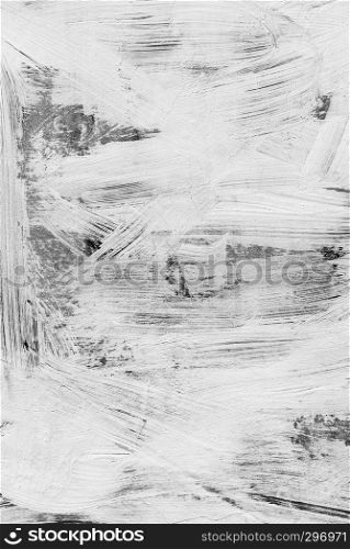 Abstract background photo texture white brush strokes paint pattern over dark wall. Retro and vintage background.