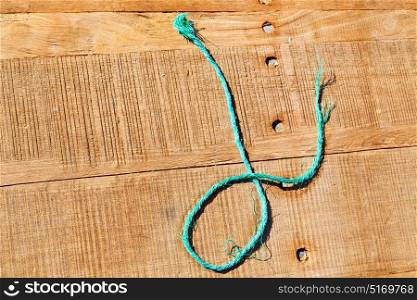 abstract background texture of a brown antique wooden floor and rope
