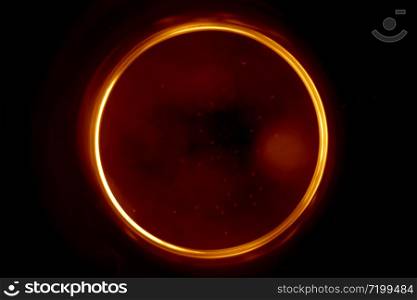 Abstract background with a black hole in blur. Blurry image of a black hole. Sphere on black background.