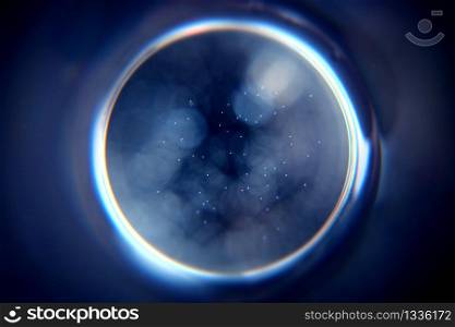 Abstract background with a black hole. Sphere on black background.