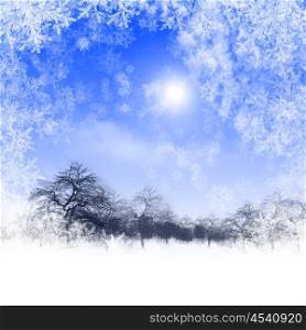 Abstract background with blue skies and sunshine. Christmas in the winter landscape. Happy New Year and Merry Christmas!