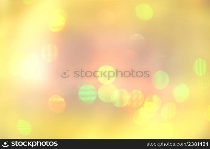 Abstract background with bokeh defocused lights. Gold abstract background. Gold bokeh background