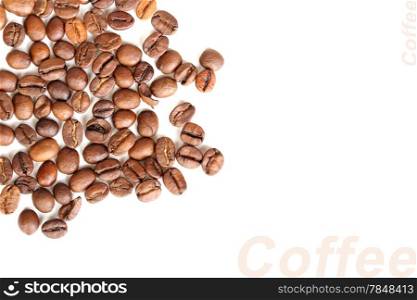 Abstract background with pile of roasted black coffee beans. Placed on white backdrop. Close-up. Studio photography.