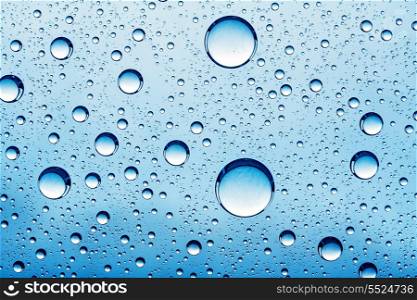 Abstract backgrounds with oil drops over glass