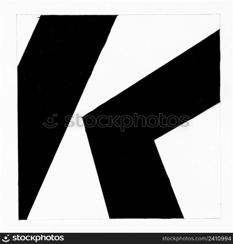 abstract black and white graphic composition with letter K hand drawn with black paint on white paper