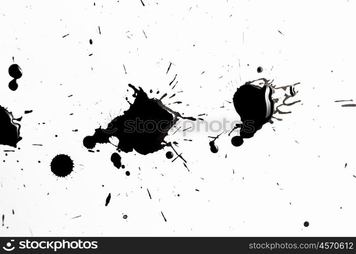 Abstract black splashes. Abstract image with splashes of black paint on white background