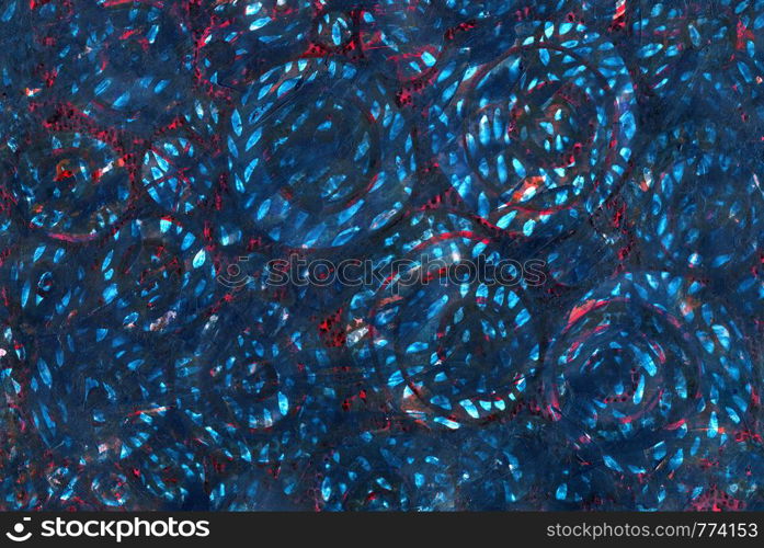 Abstract blue and red background. Grunge texture with scratches, dots and lines, with circles and white spots. Brush imprint, flower buds, body cell. Medicine, biology, chemistry. Hand drawn.. Abstract blue and red background.