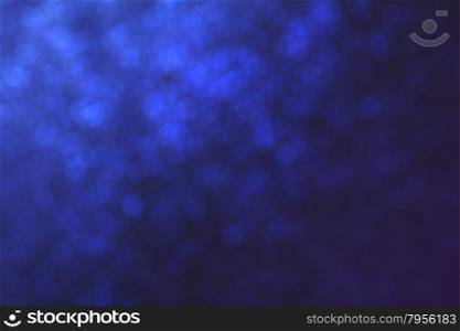 Abstract blue background,Festive abstract background with defocused lights and texture