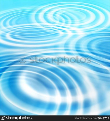 Abstract blue background with concentric ripples