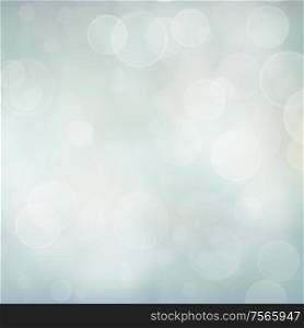 abstract blue bokeh background with bubbles and flares