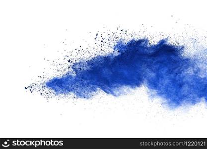 Abstract blue powder explosion. Closeup of blue dust particle splash isolated on white background
