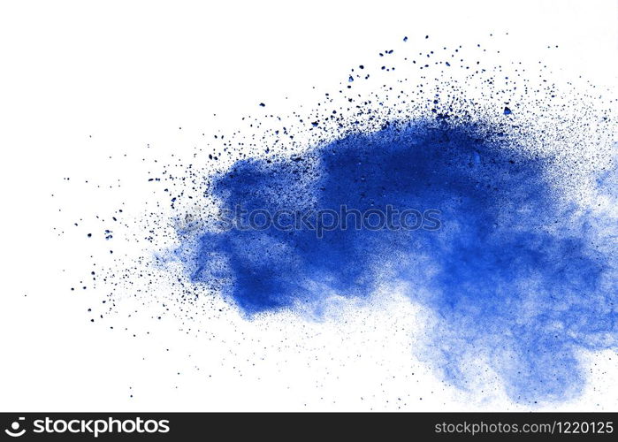 Abstract blue powder explosion. Closeup of blue dust particle splash isolated on white background