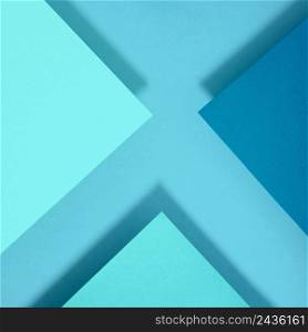 abstract blue x letter polygon paper design